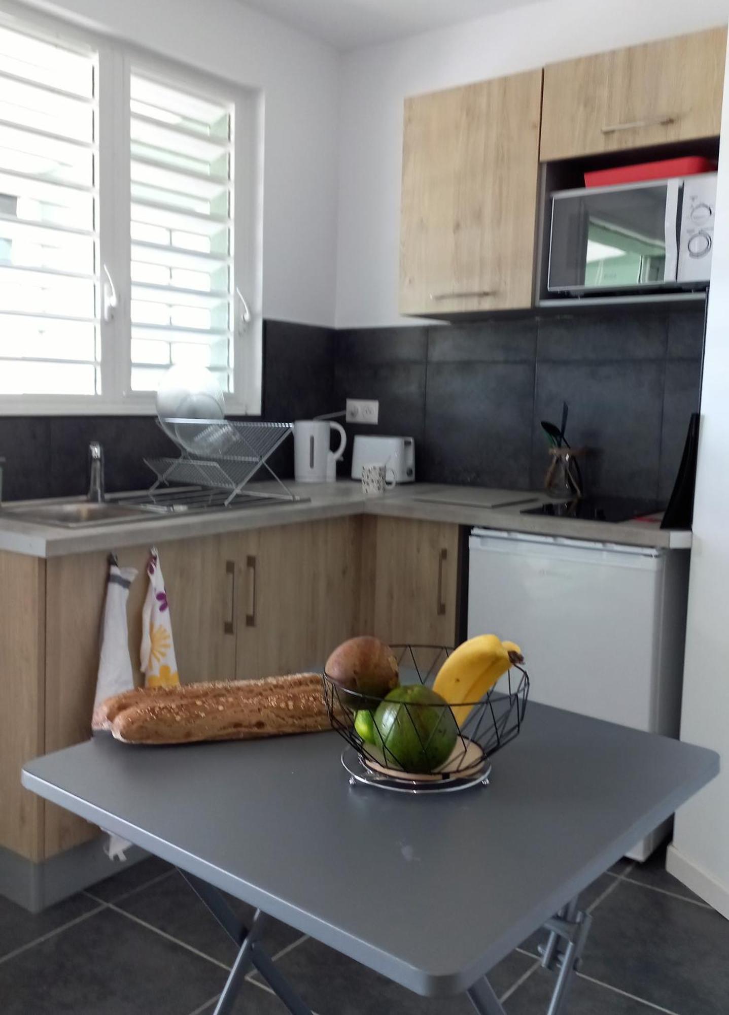Logements Vue Mer Acces Piscine En Guadeloupe Bouillante Esterno foto