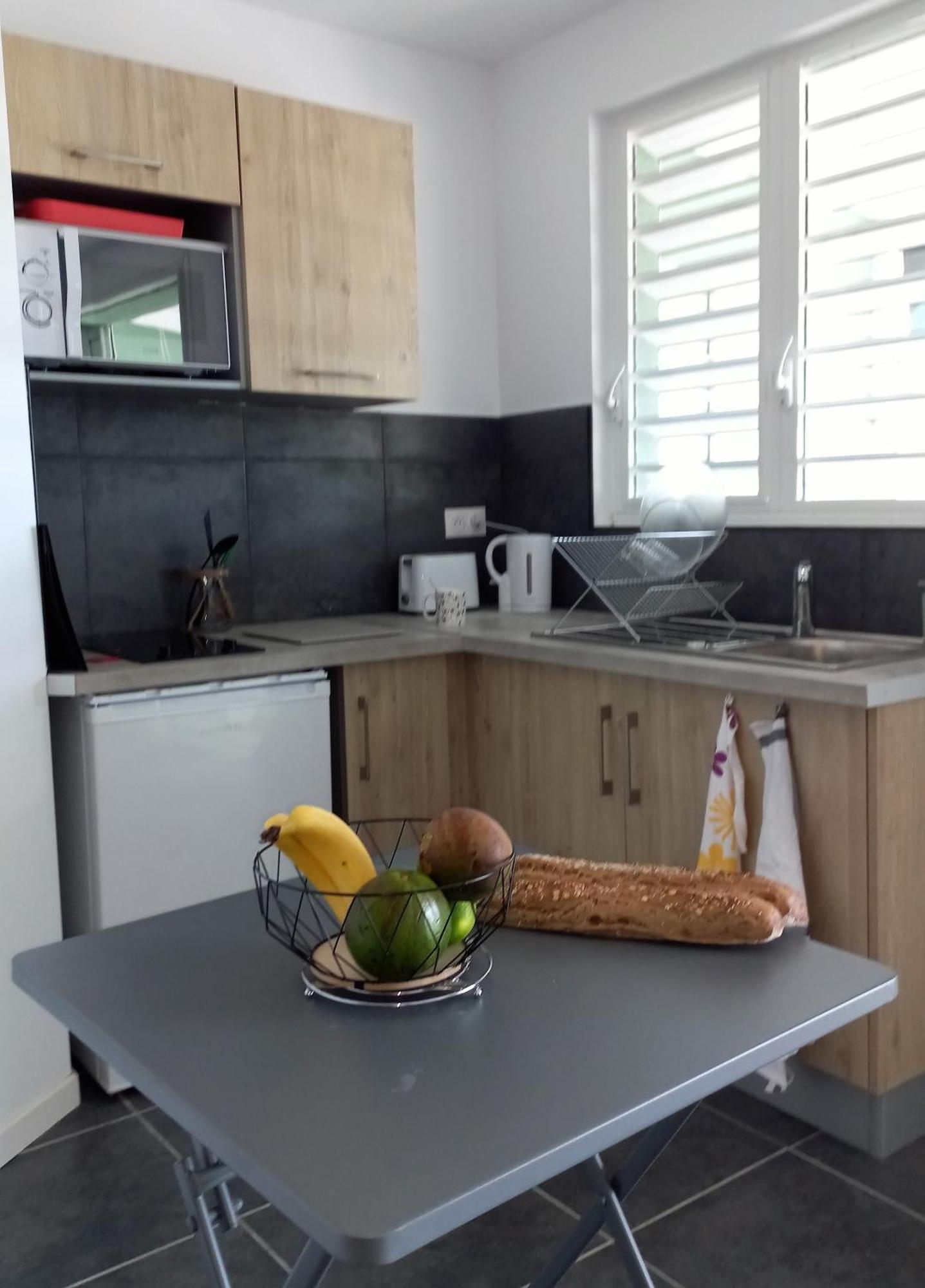 Logements Vue Mer Acces Piscine En Guadeloupe Bouillante Esterno foto